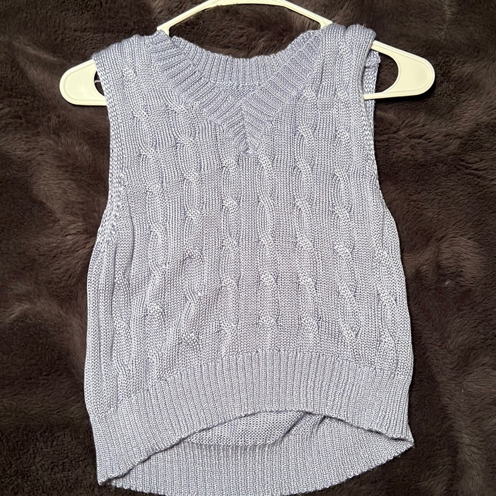 Small sweater vest.